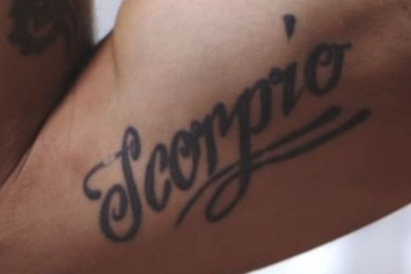  virat kohli tattoo photo having Scorpion that symbolizes determination, intensity, and loyalty